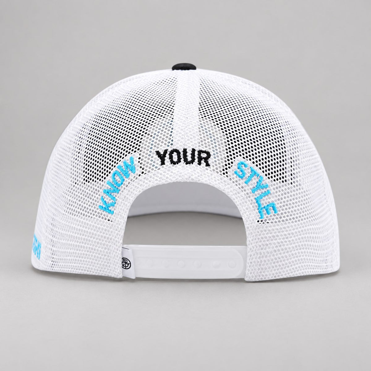 Black & White Classic Trucker Mesh Cap — back embroidery and closure