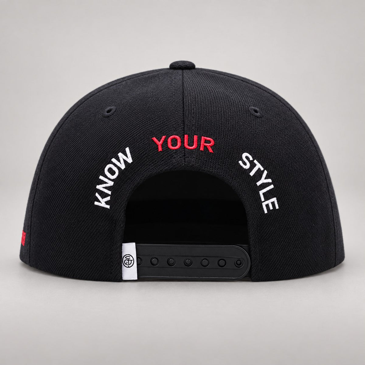Black & White Snapback Cap — back embroidery and closure